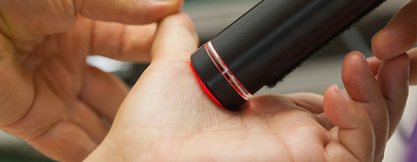 patient receiving cold laser therapy in Colville