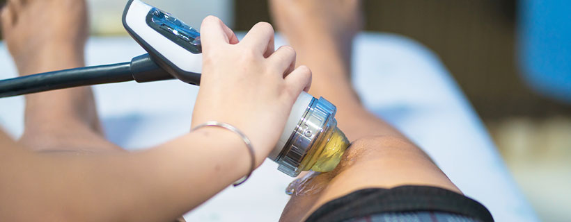 patient receiving shockwave therapy in Colville